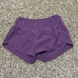 Gaiam size small purple shorts with lining. EUC.